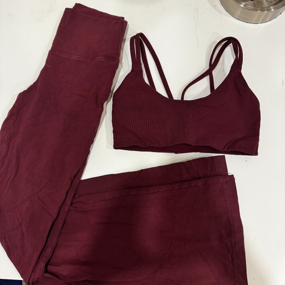 maroon TNA TNAction aritzia sports bra and yoga pants set